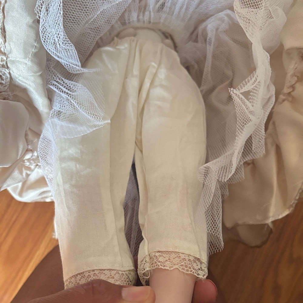 Charming Porcelain Cream Doll with Lace Accents - Picture 11 of 11